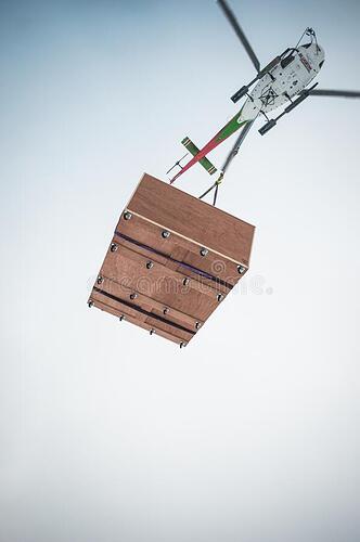 helicopter-delivery-picture-pilot-droping-oc-white-dropping-off-wooden-plywood-box-177002366